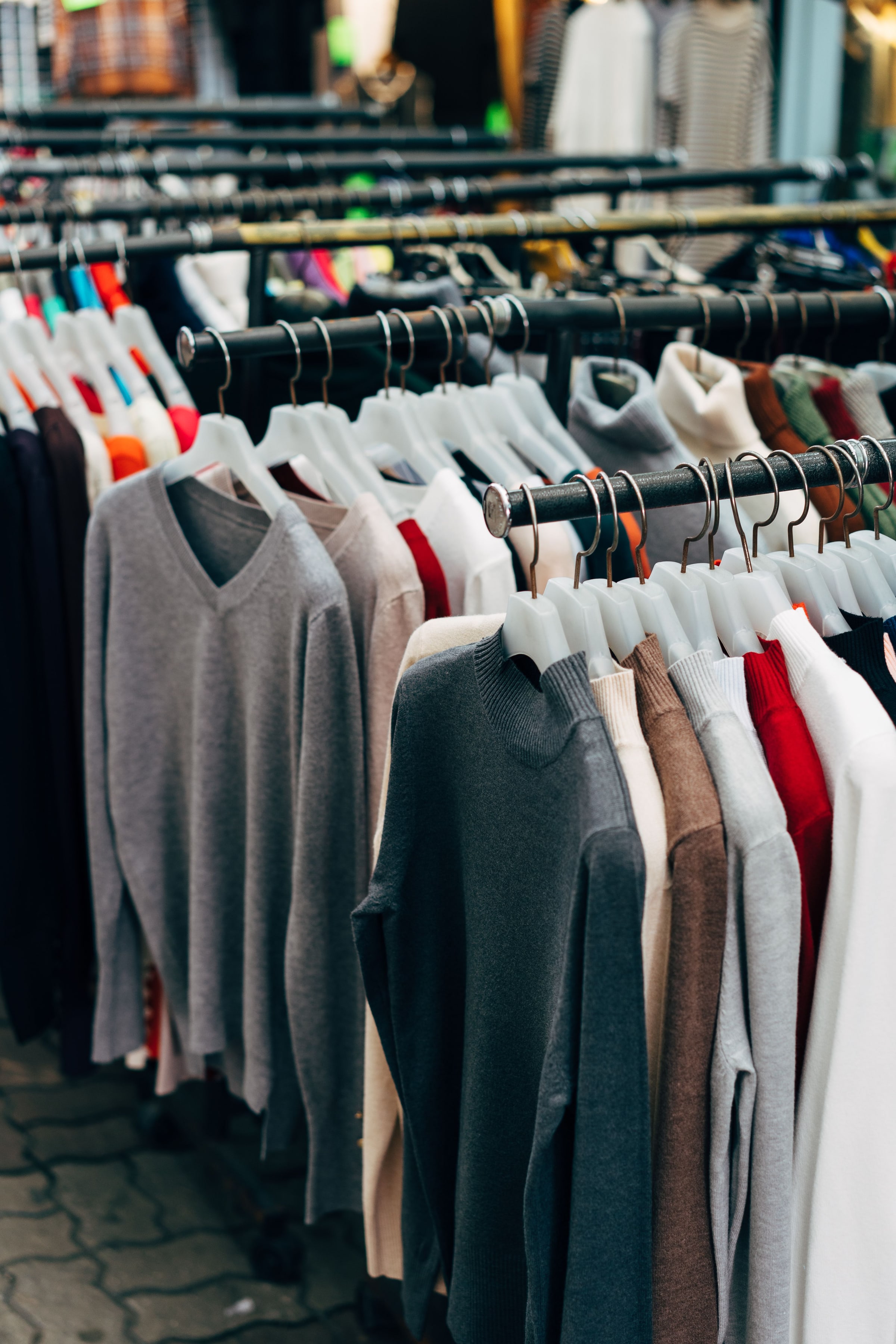 Sweaters and woollens on a clothing rail