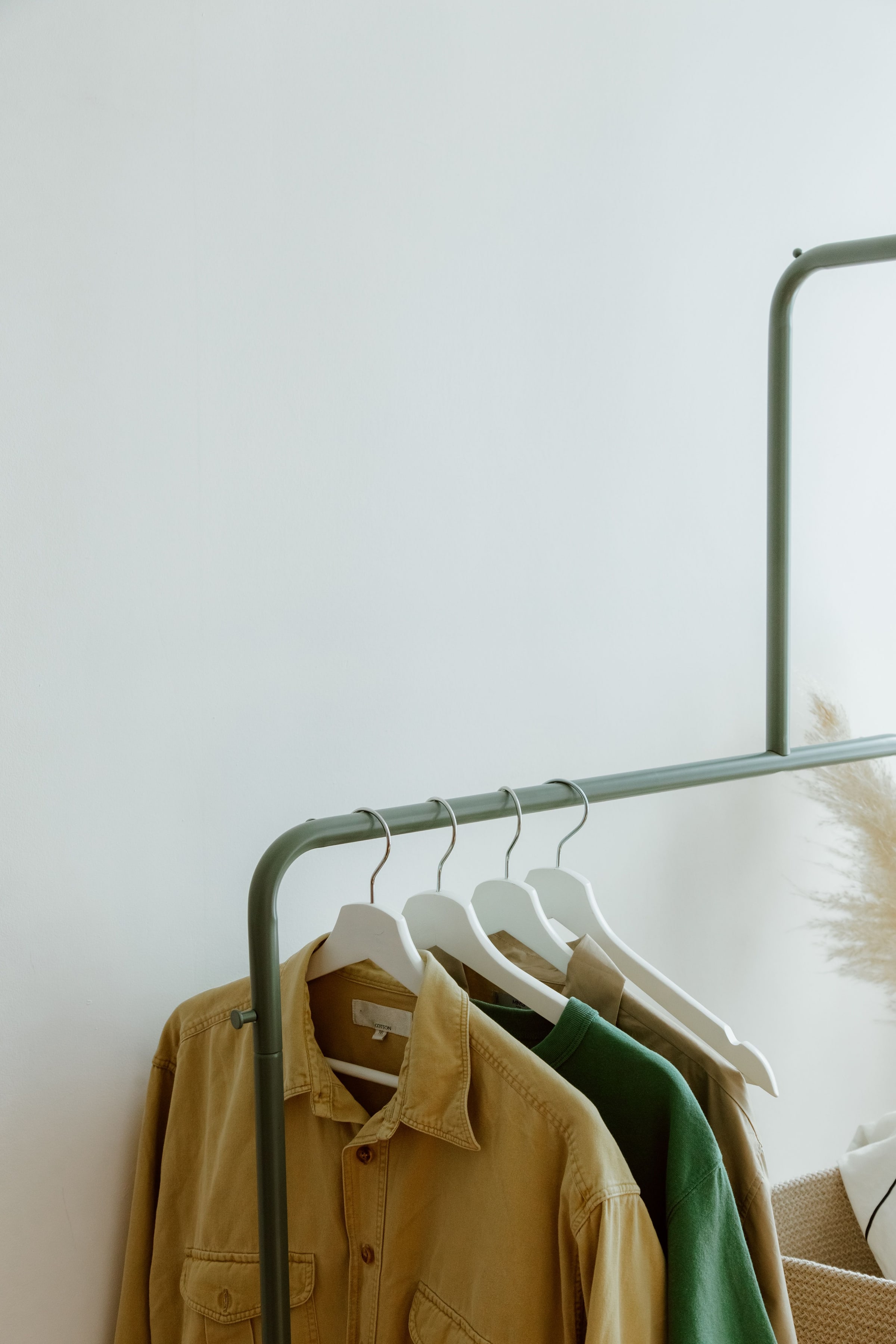 Freshly washed shirts on hangers
